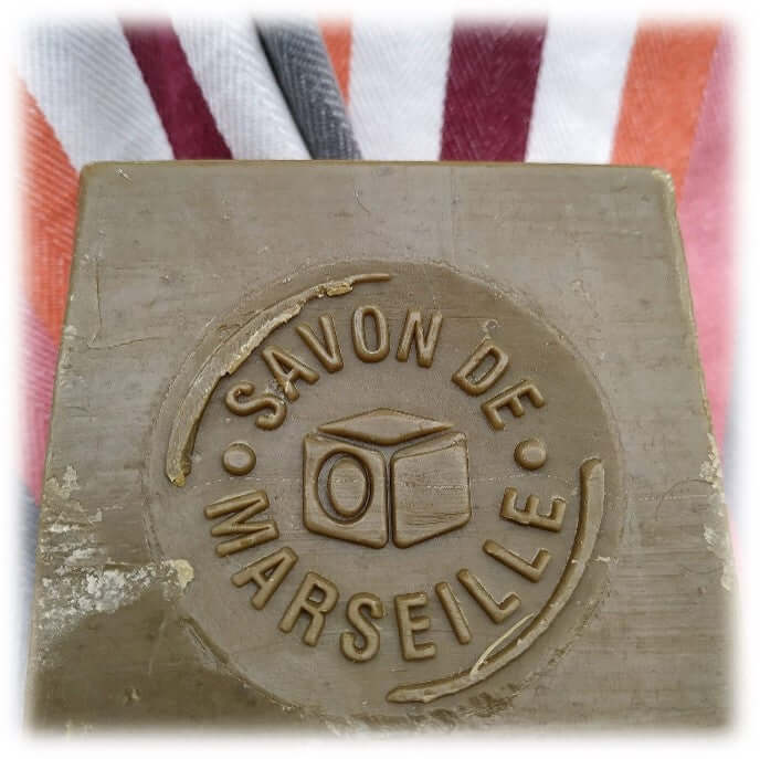 Original 600g cube of Savon de Marseille, naturally olive green and perfume free.