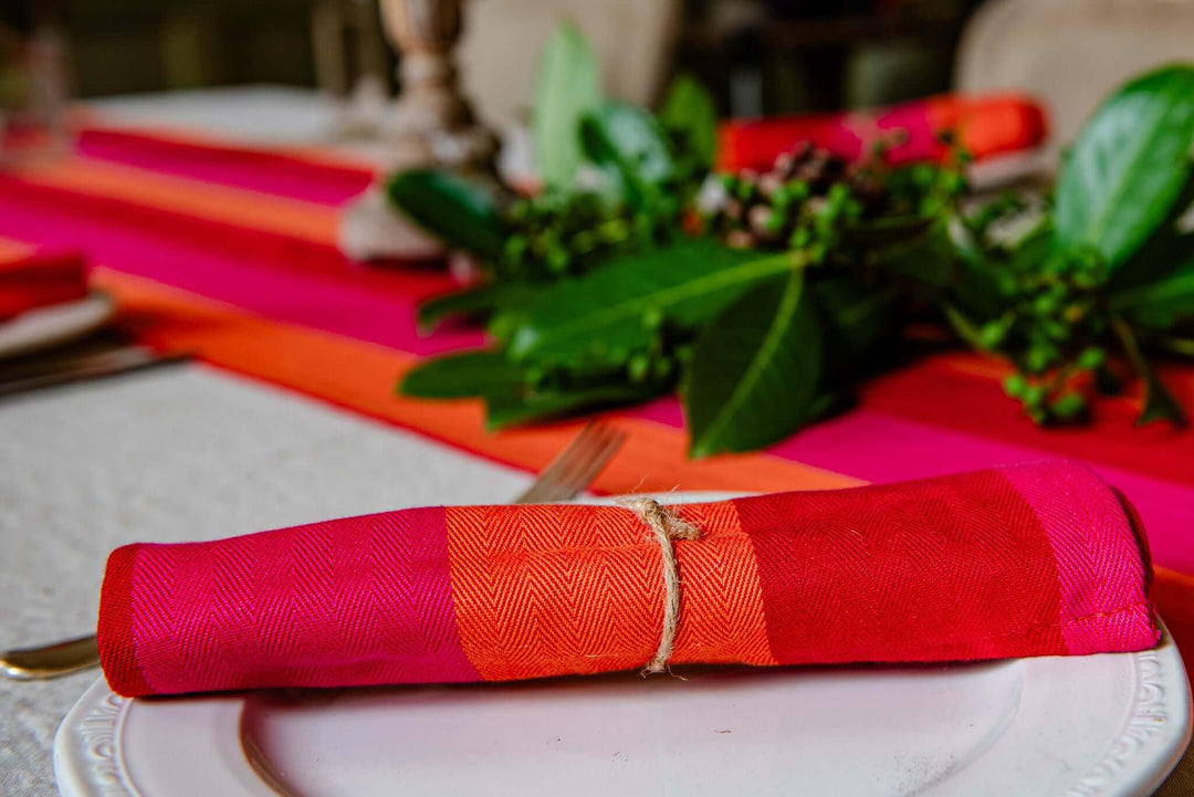 A Pair of Red Orange Pink Napkins: A Sustainable Touch of Colour to Your Table