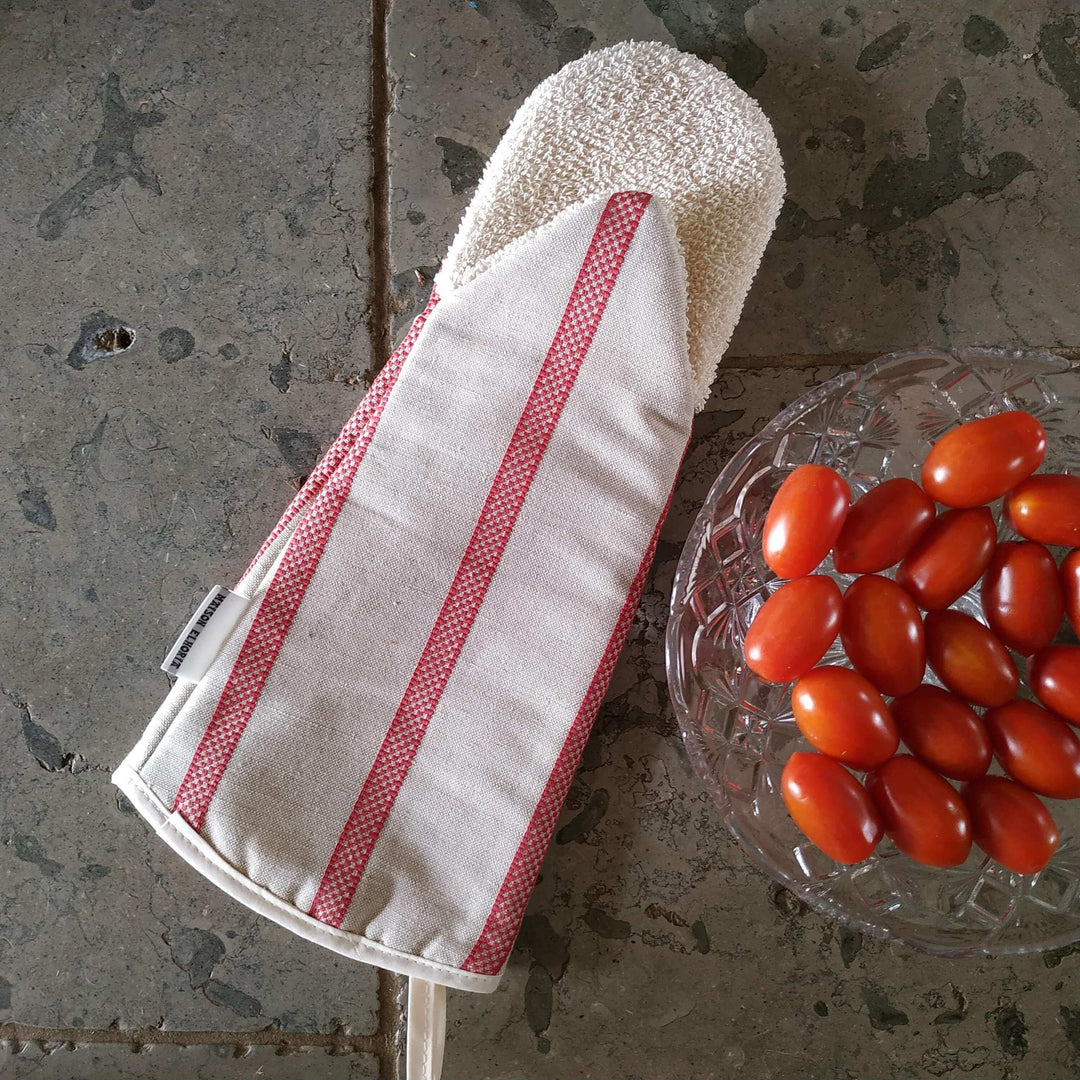 Gauntlet long oven glove linen union with red stripes with cherry tomatoes on grey stone background