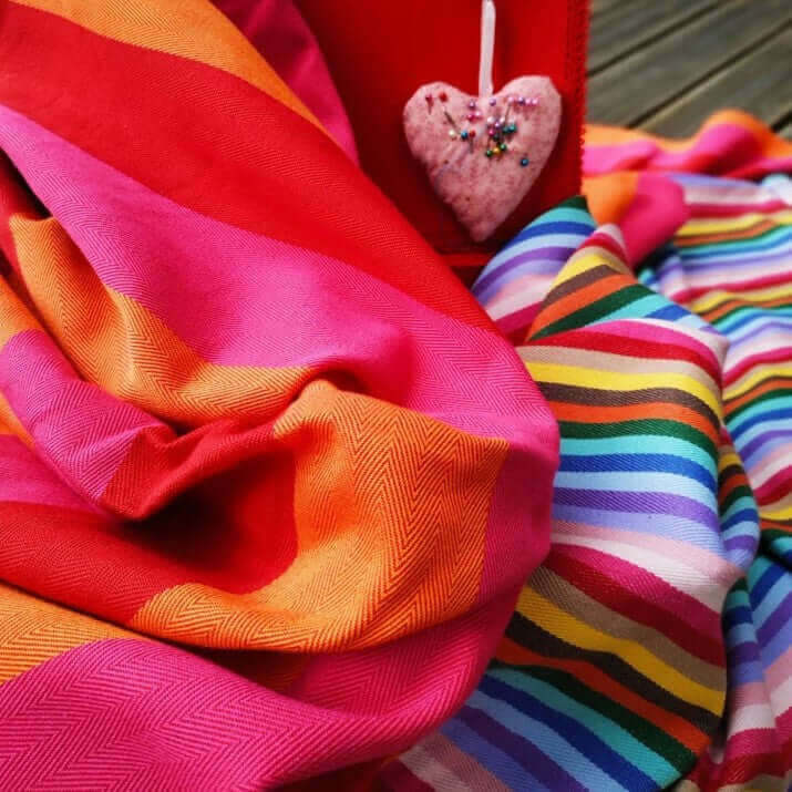 both Rainbow  and read orange pink stripes fabrics organic and recycled cotton with a heart shaped pins holder 
